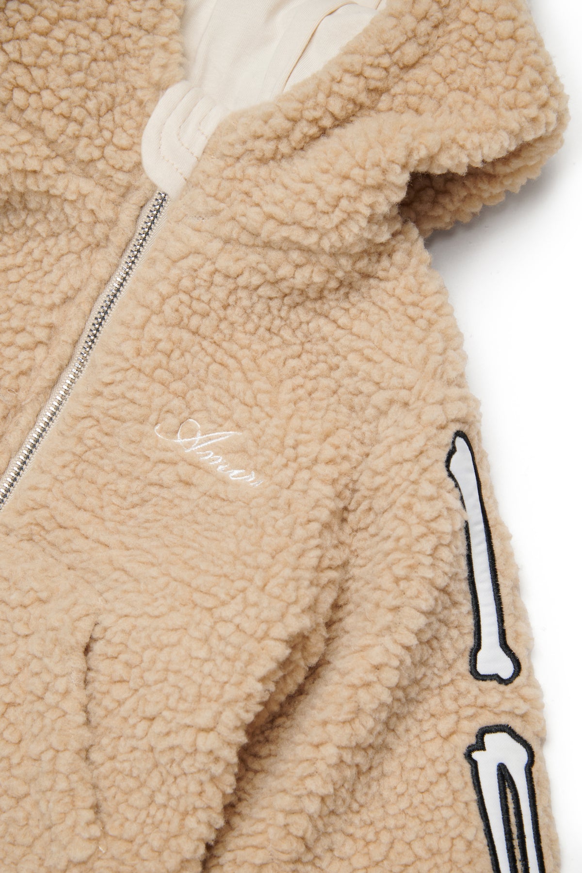 Chaqueta teddy con logo y detalles de huesos
