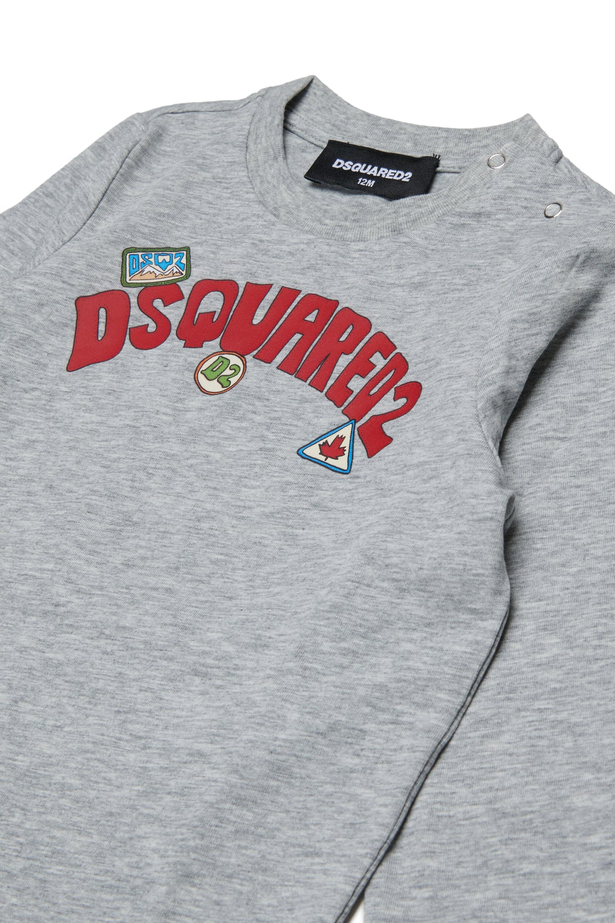 Baby jumpsuit with logo