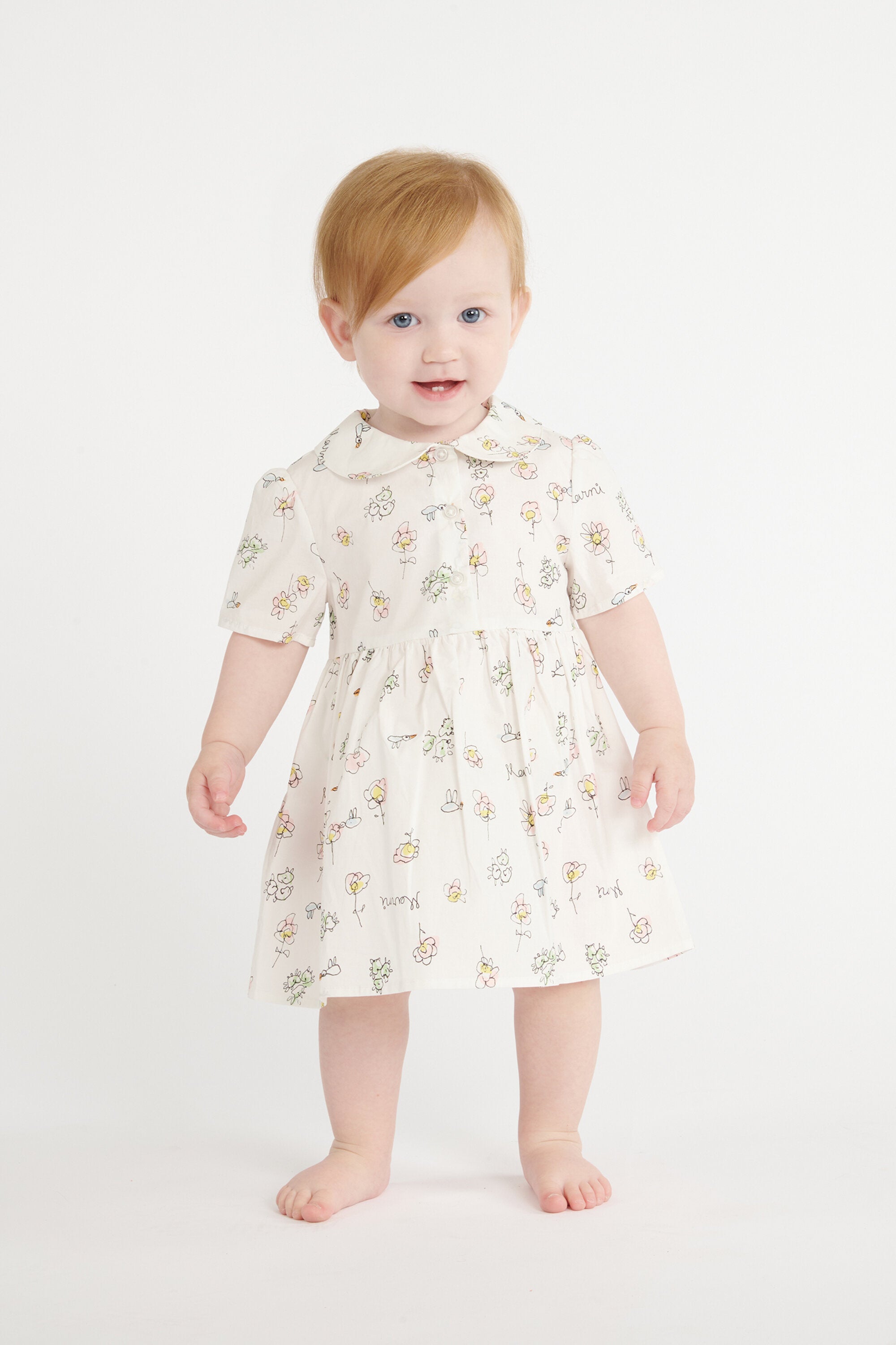 Dress with floral print and rounded collar