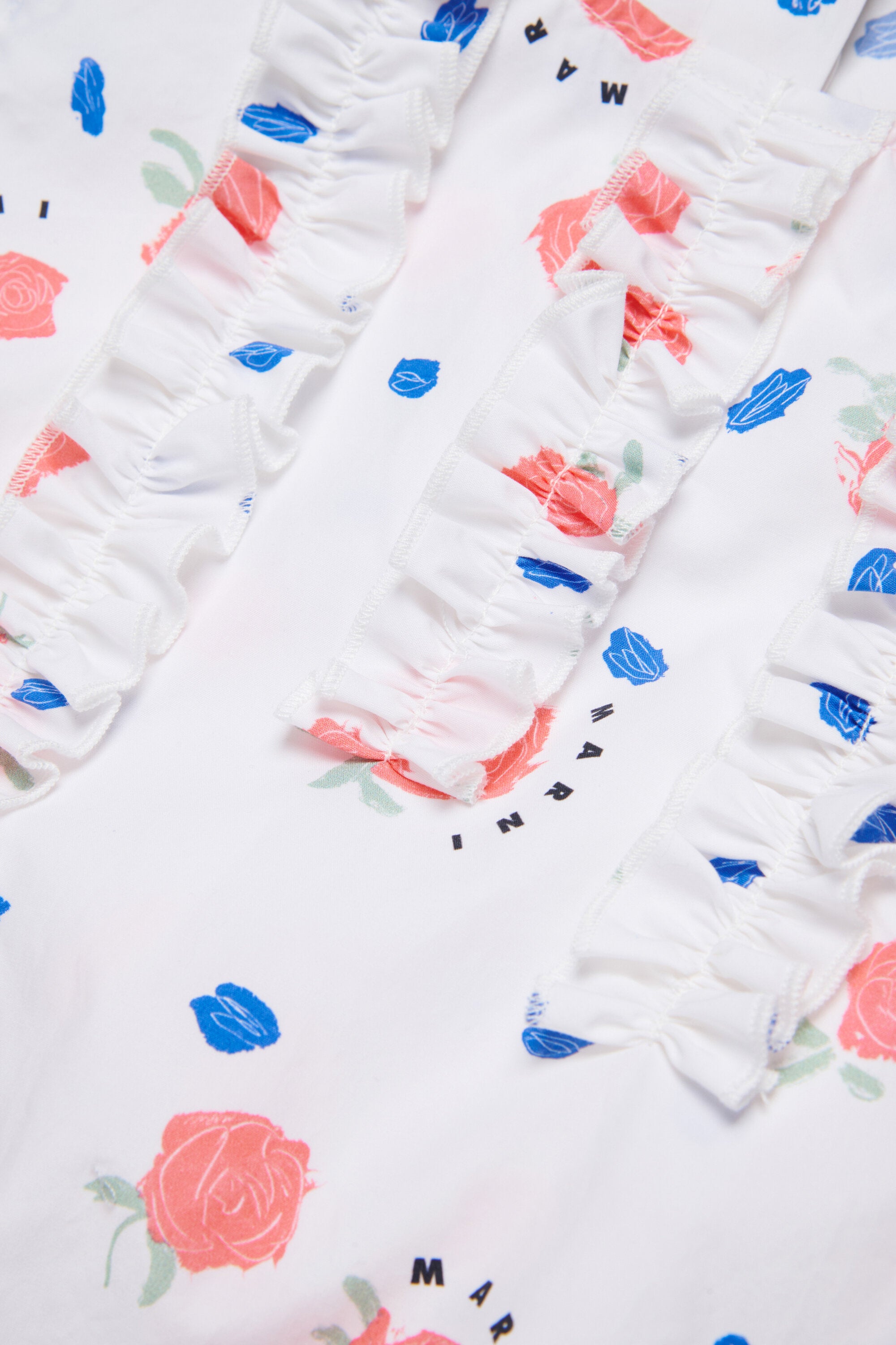 Chemise sans manches à volants