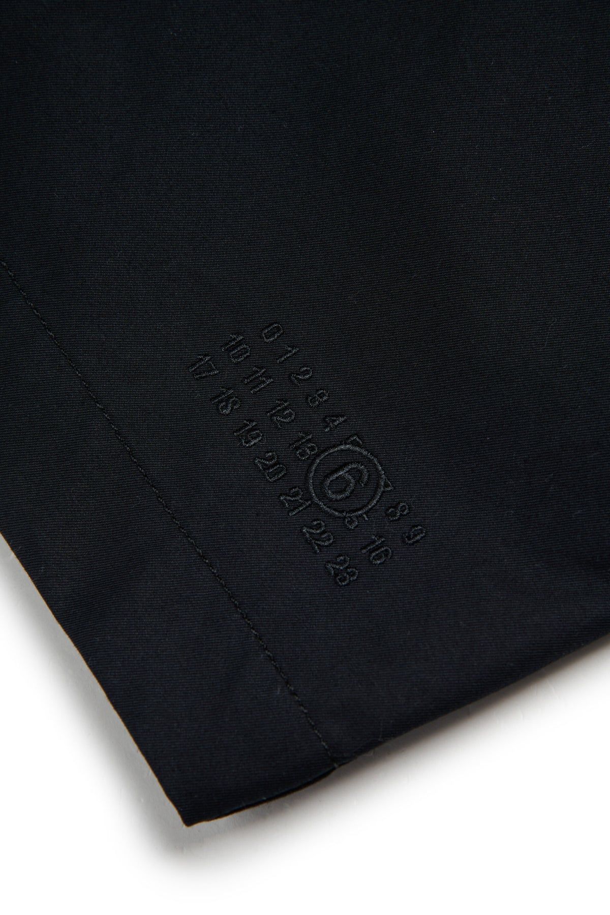 Single-breasted coat with logo