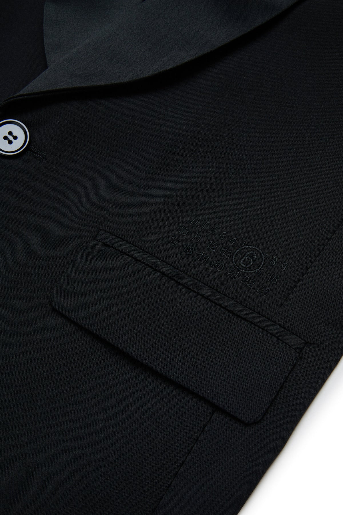 Sleeveless jacket with logo