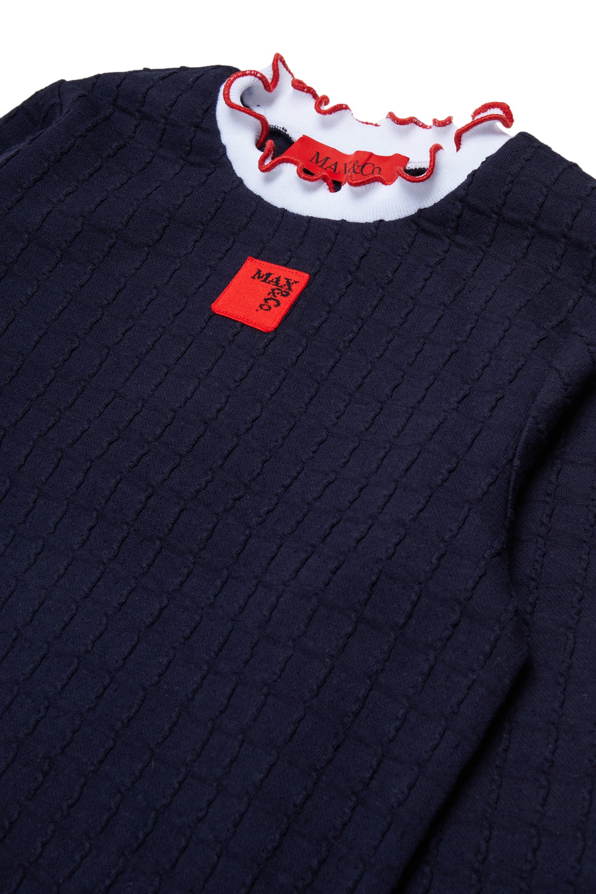 Sweat jacquard à bords ondulés