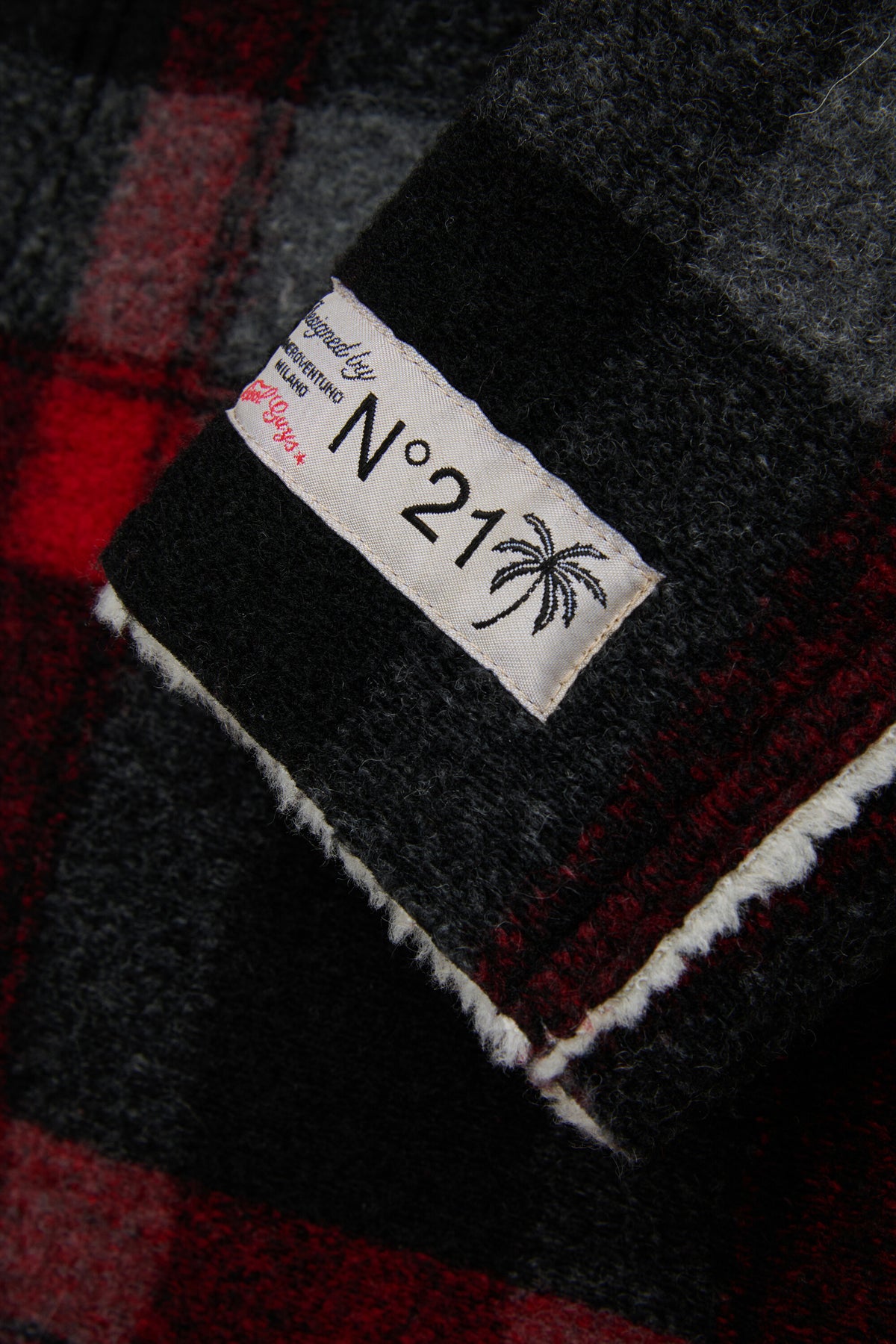 Checked coat with printed logo