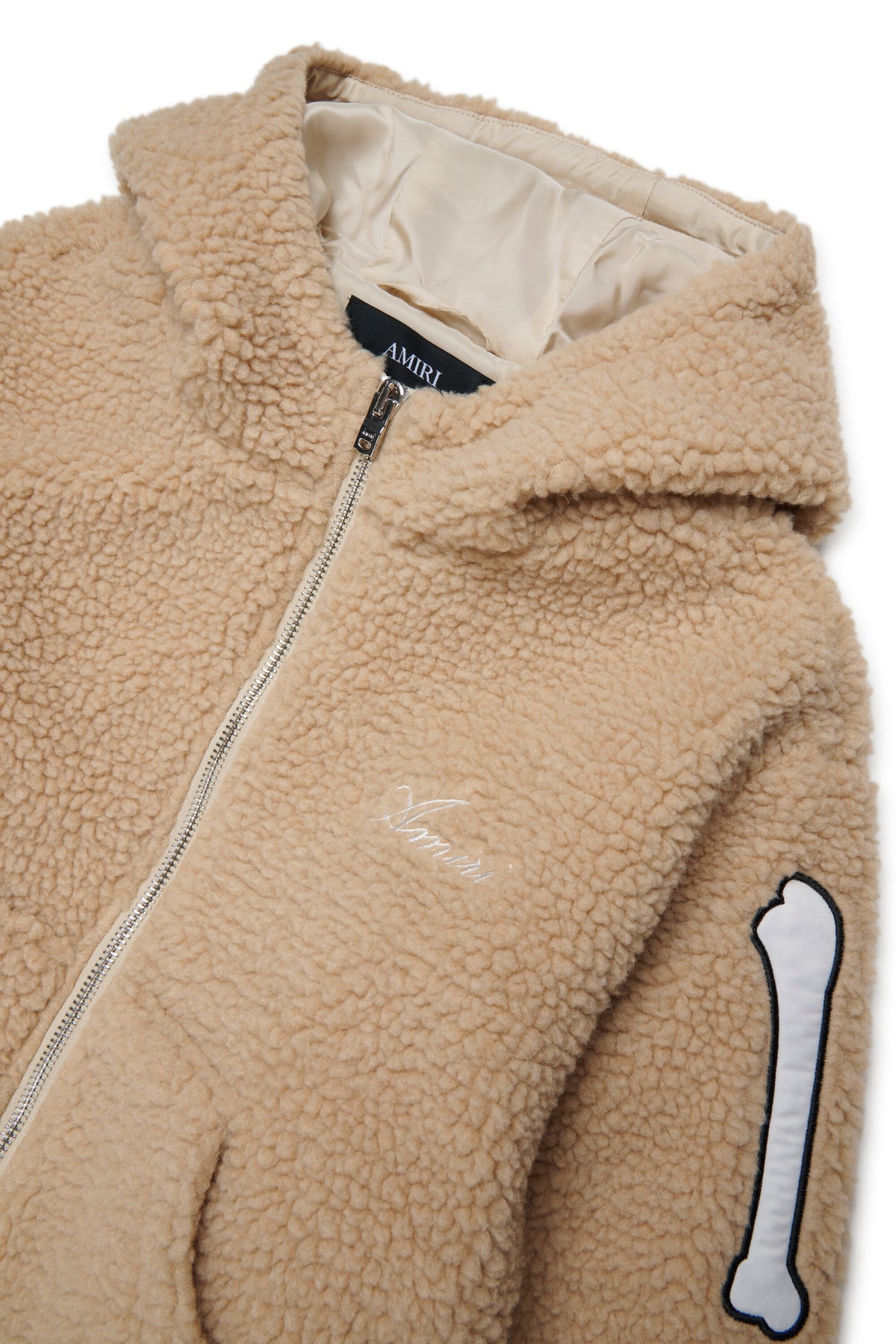 Veste teddy avec détails osseux