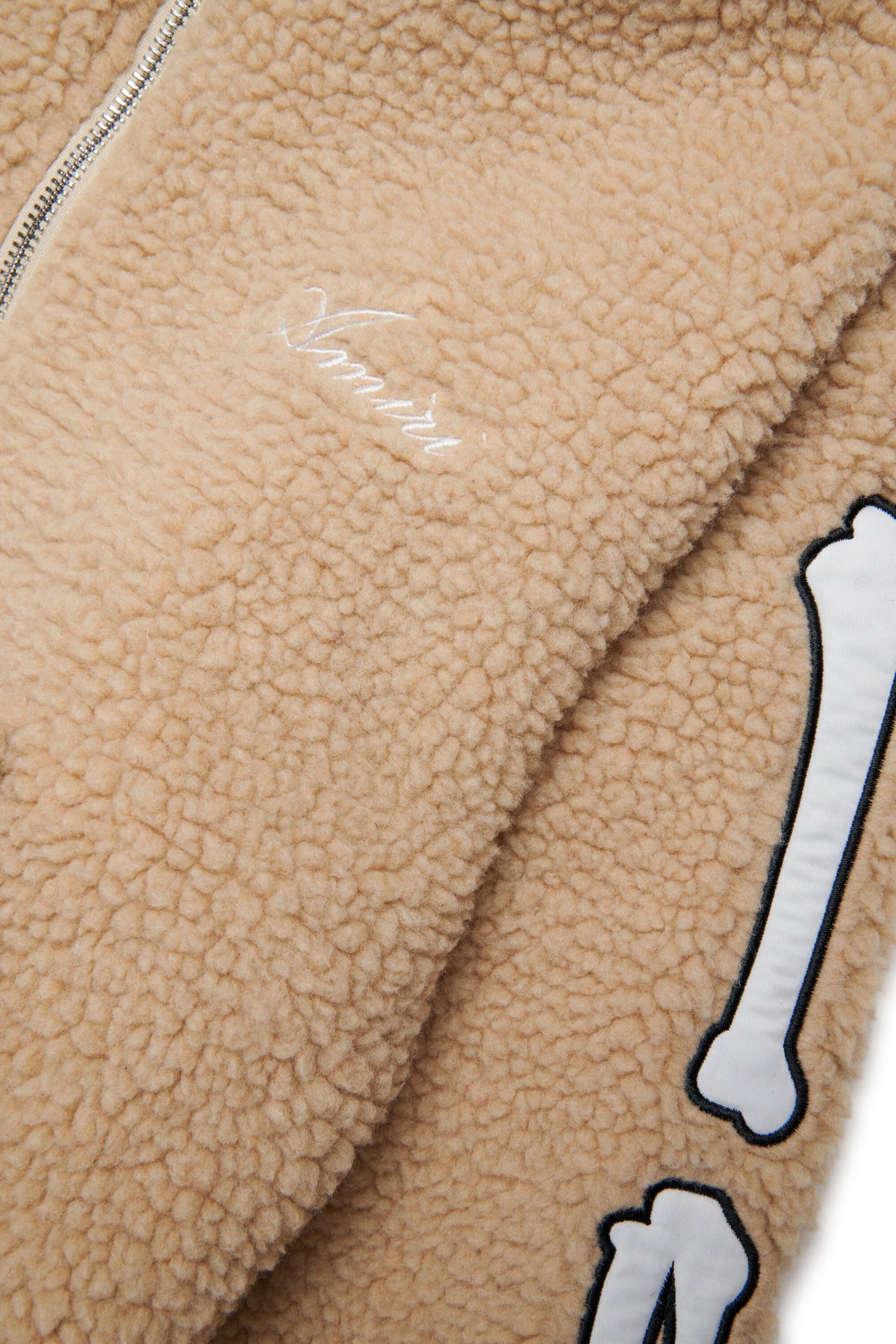 Veste teddy avec détails osseux