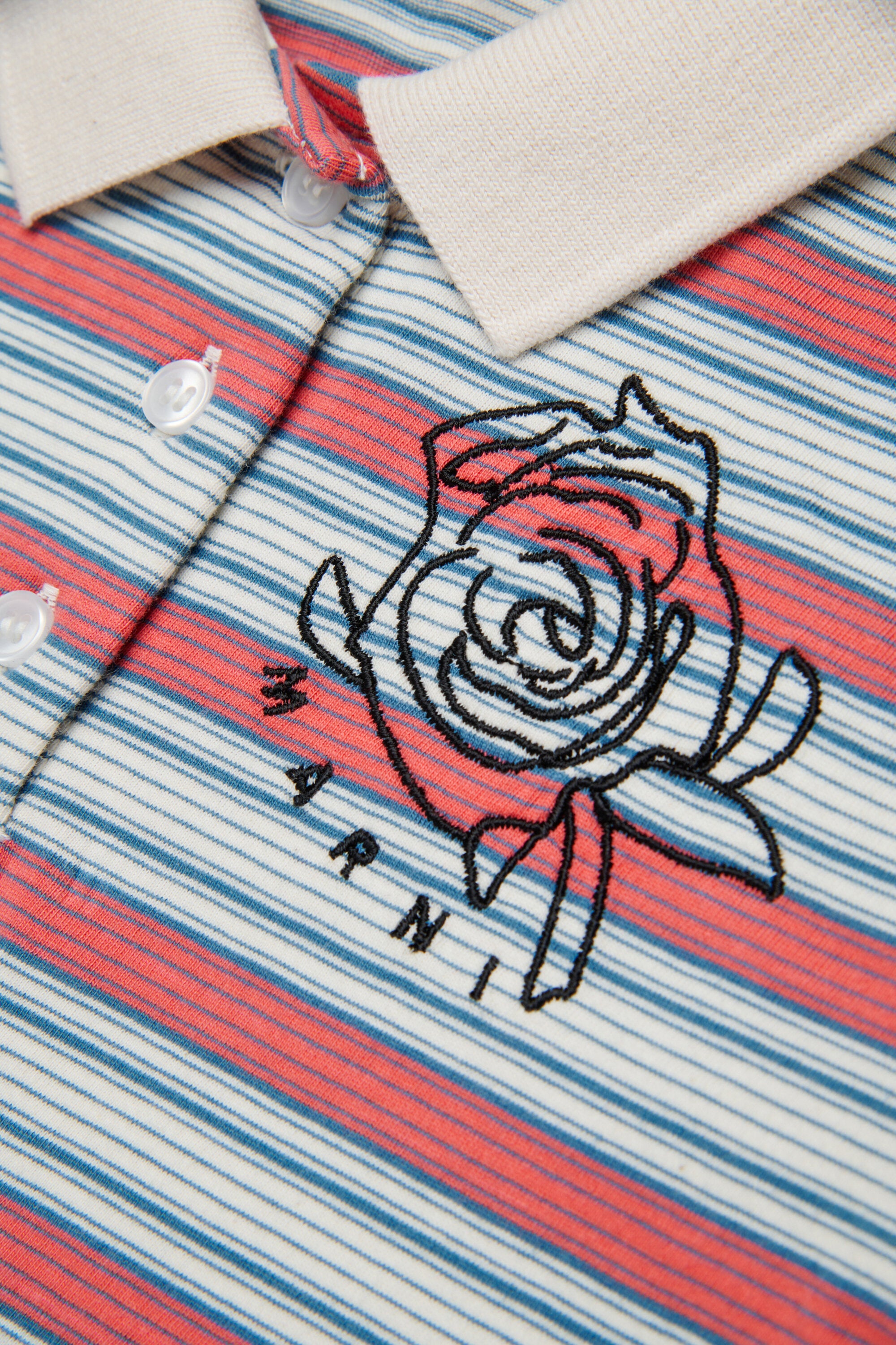 Polo a rayas con logo