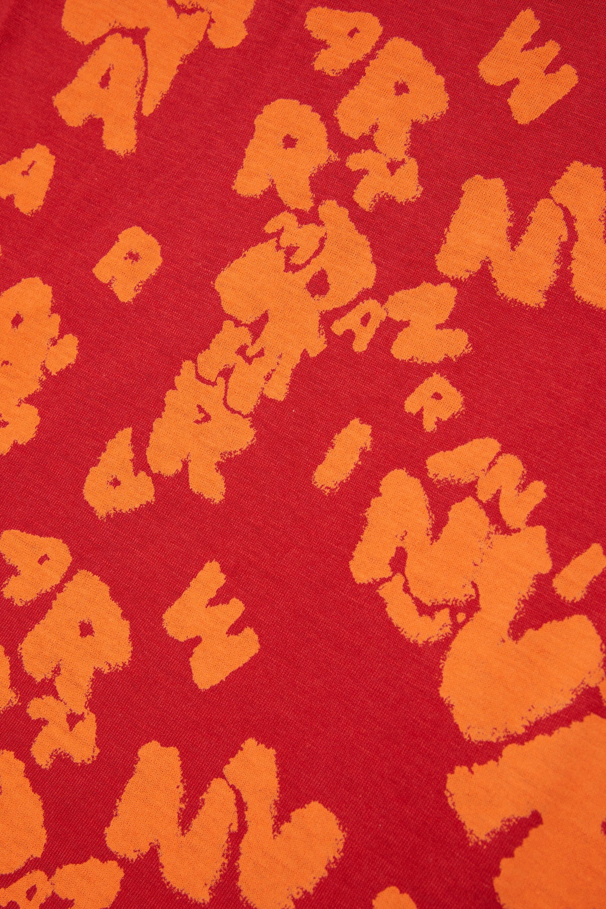 Sleeveless T-shirt with all-over logo