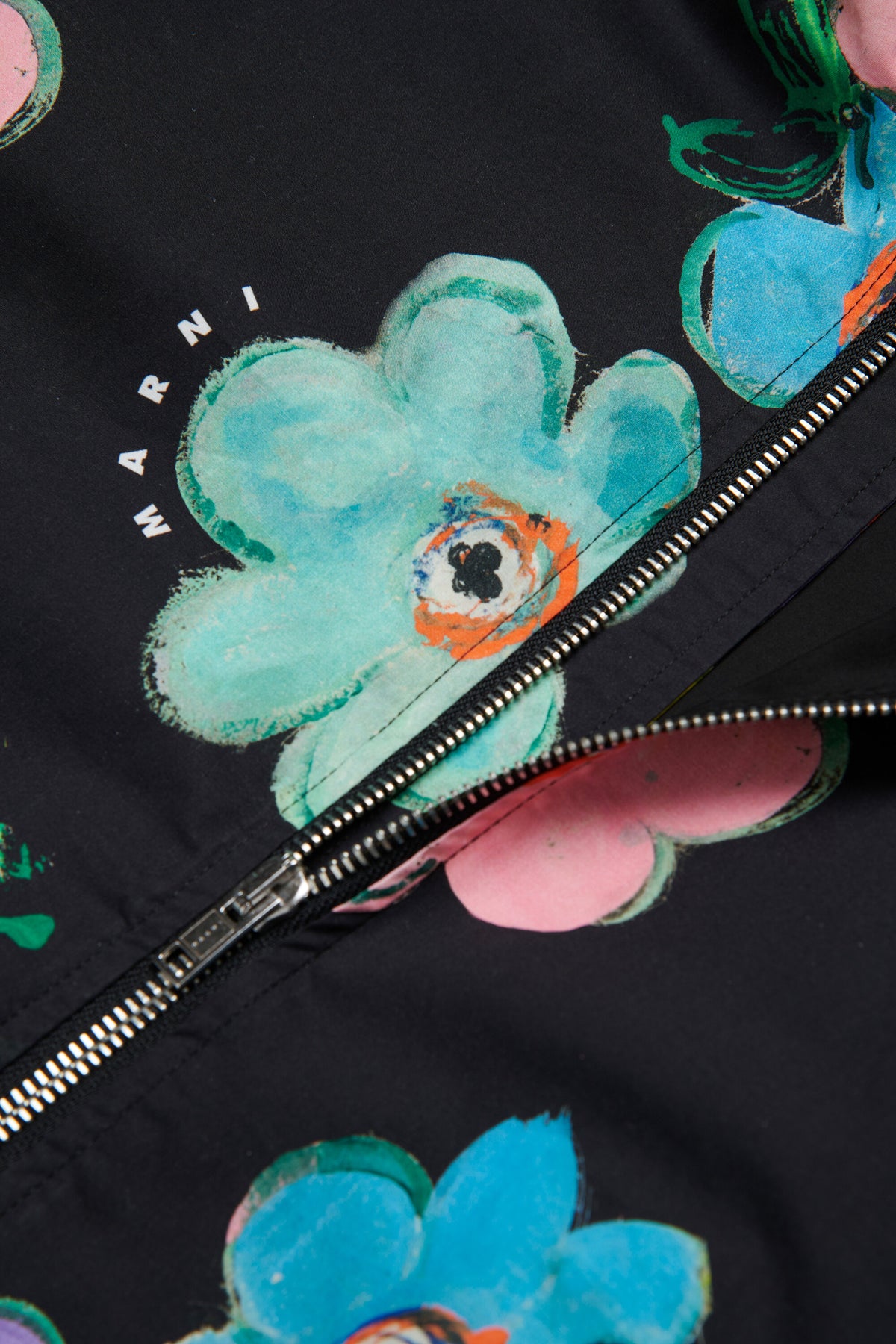 Floral windbreaker with printed logo