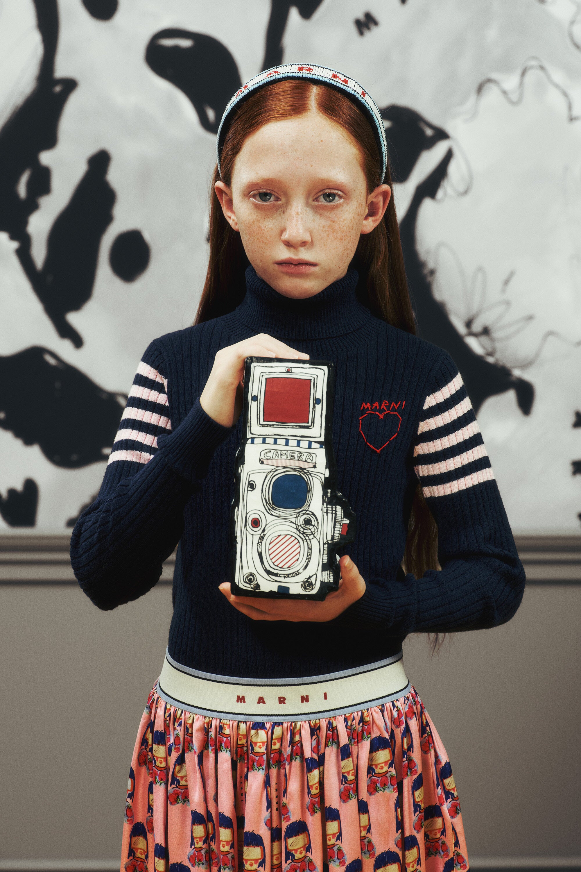 Pull à col roulé côtelé avec motif cœur