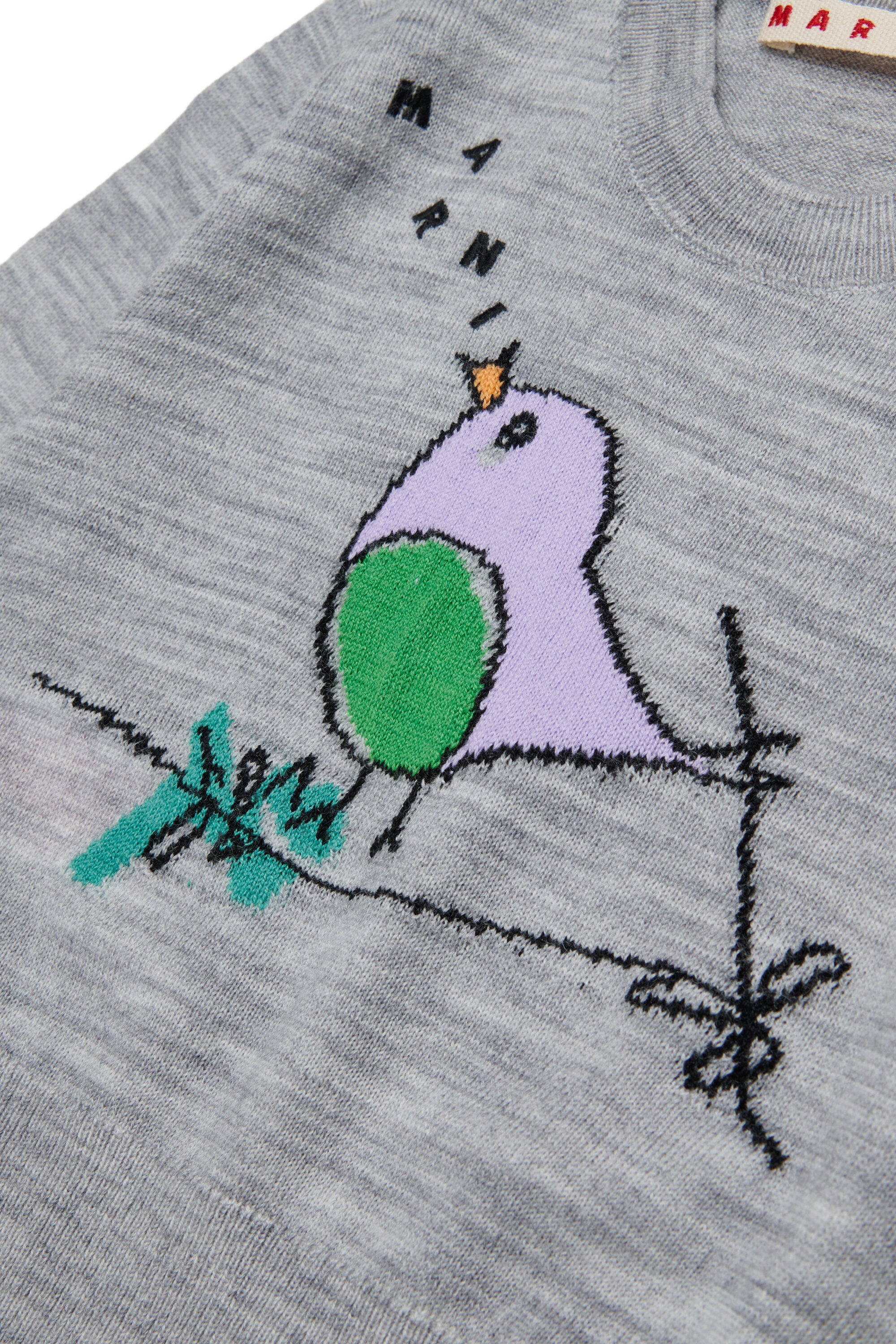 Pull col rond avec motif brodé