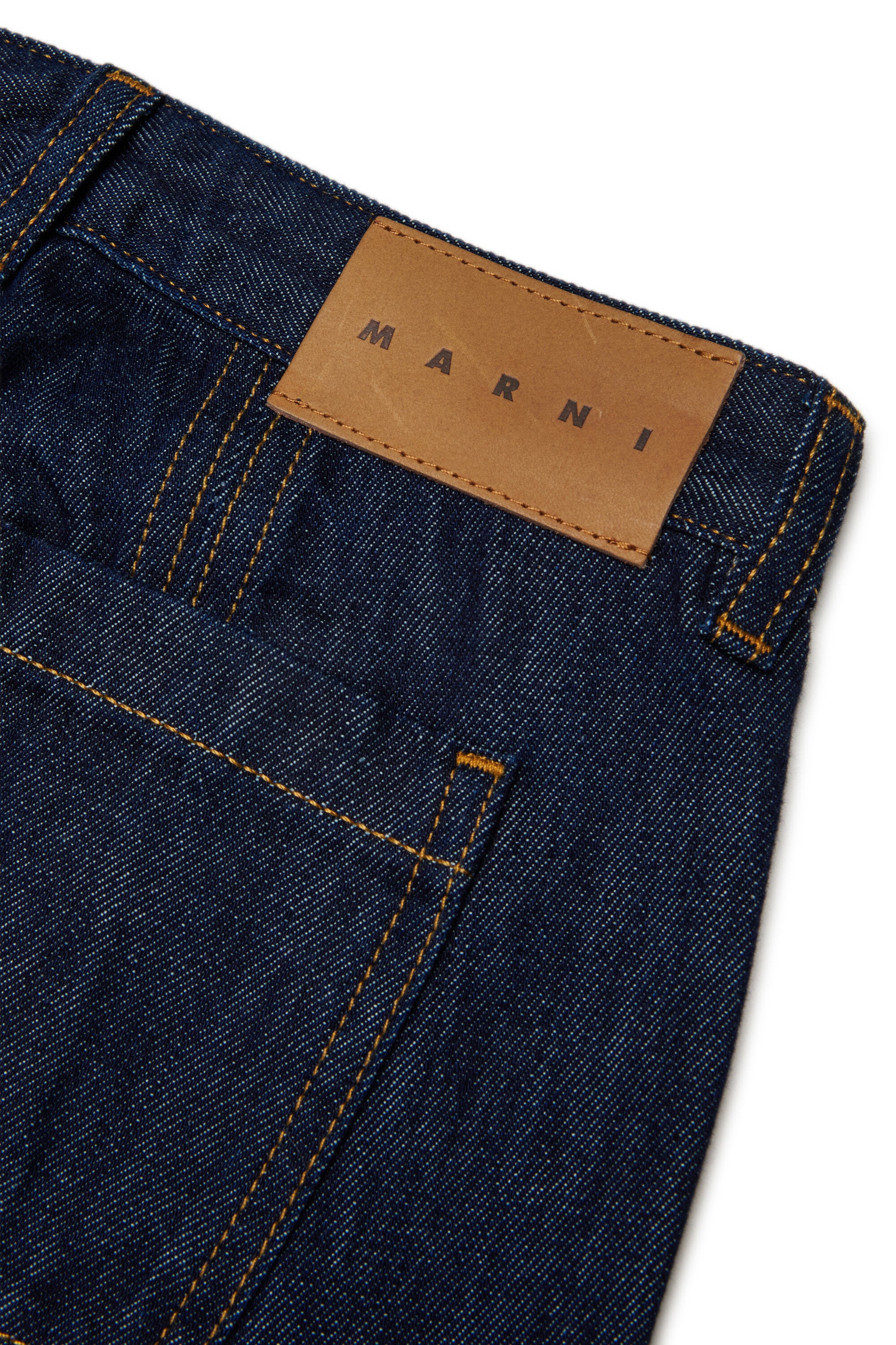 Jeans corte acampanado azul medio
