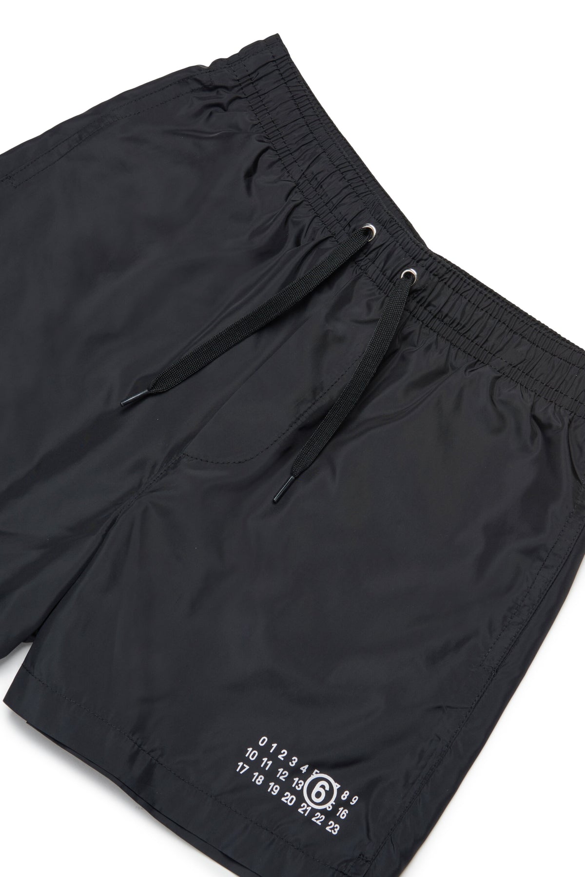 Boxer swimsuit branded with Numeric logo