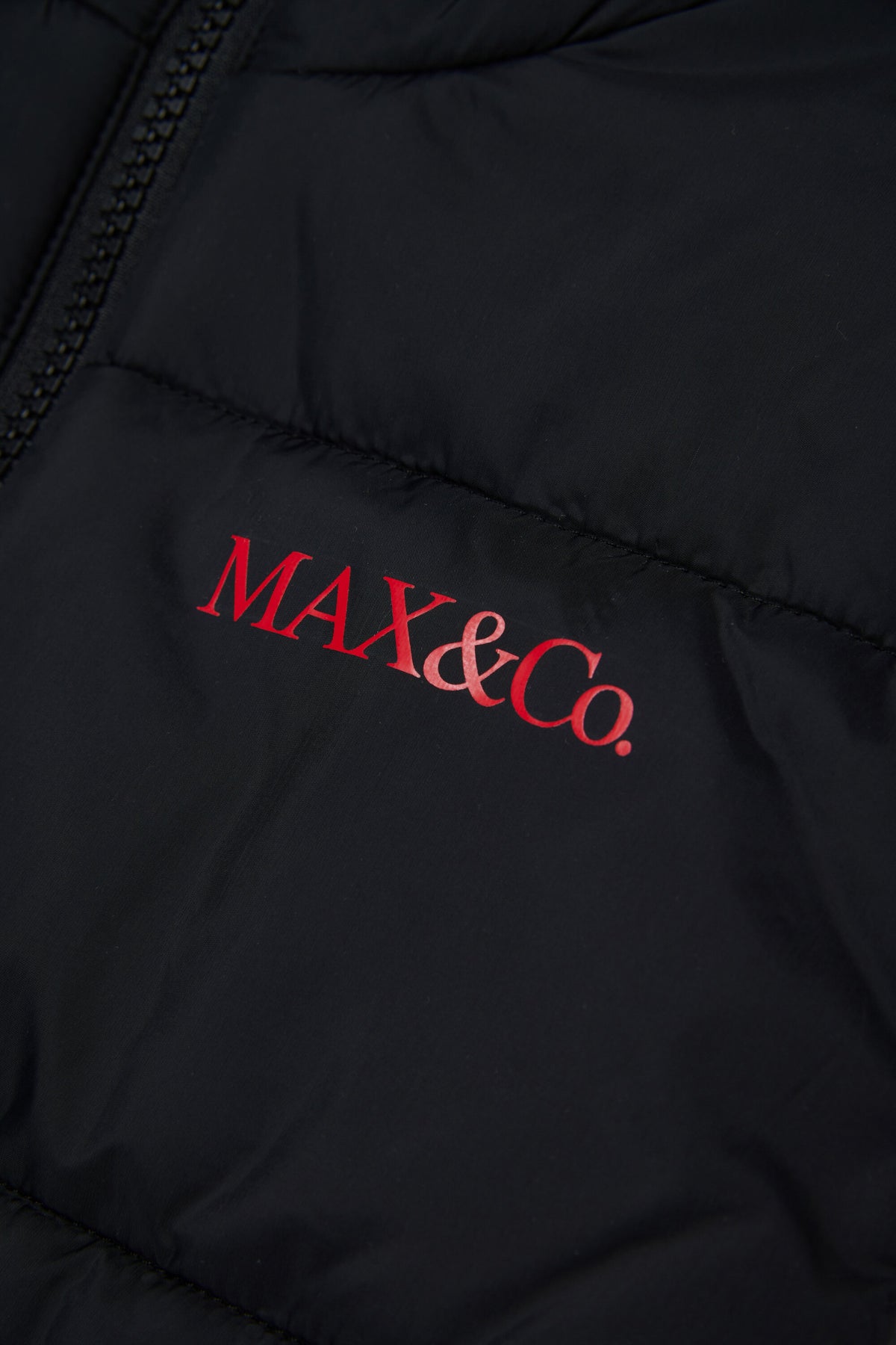 Chaleco acolchado con logo