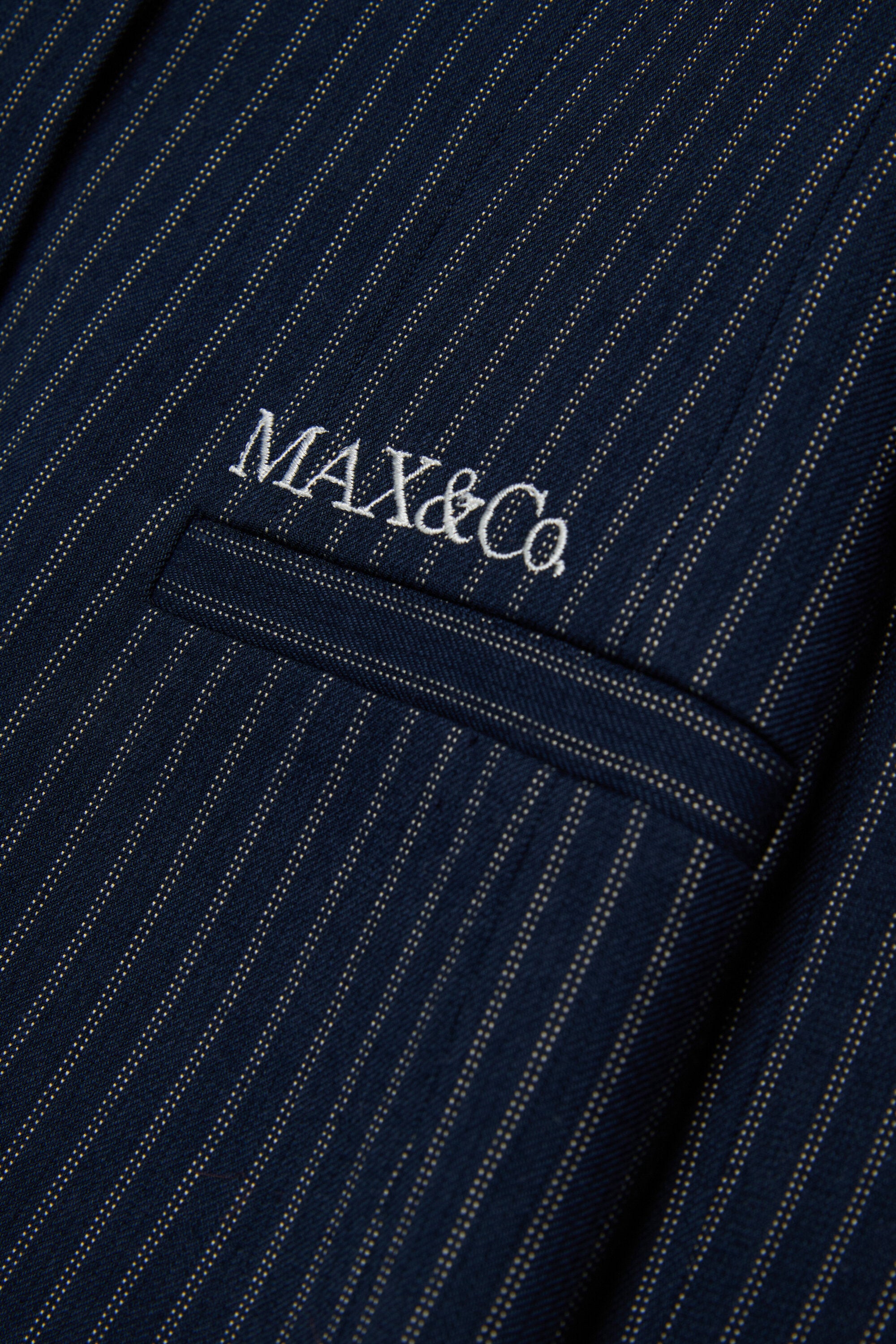 Americana con logo estampado