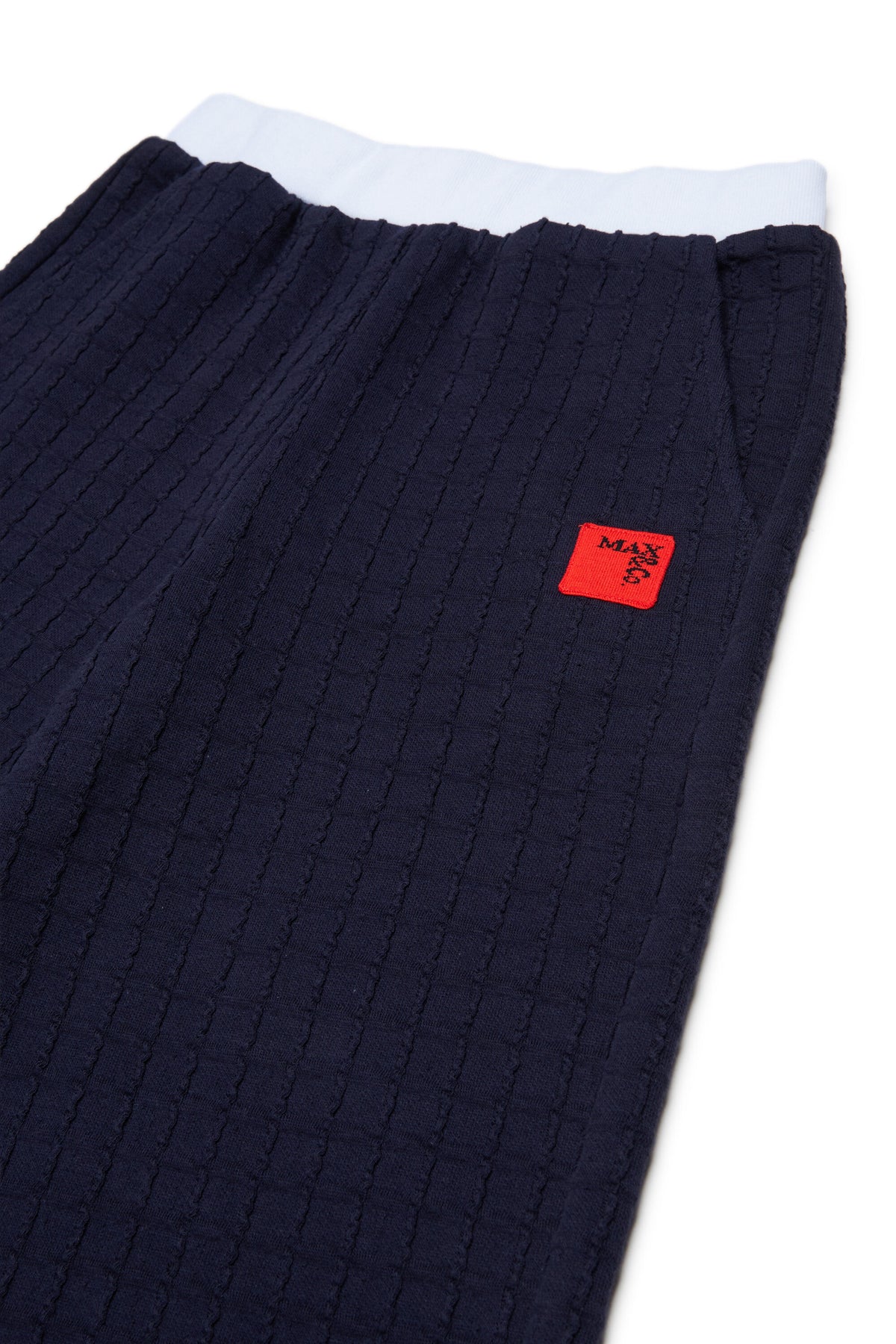 Pantalones jacquard con logo aplicado