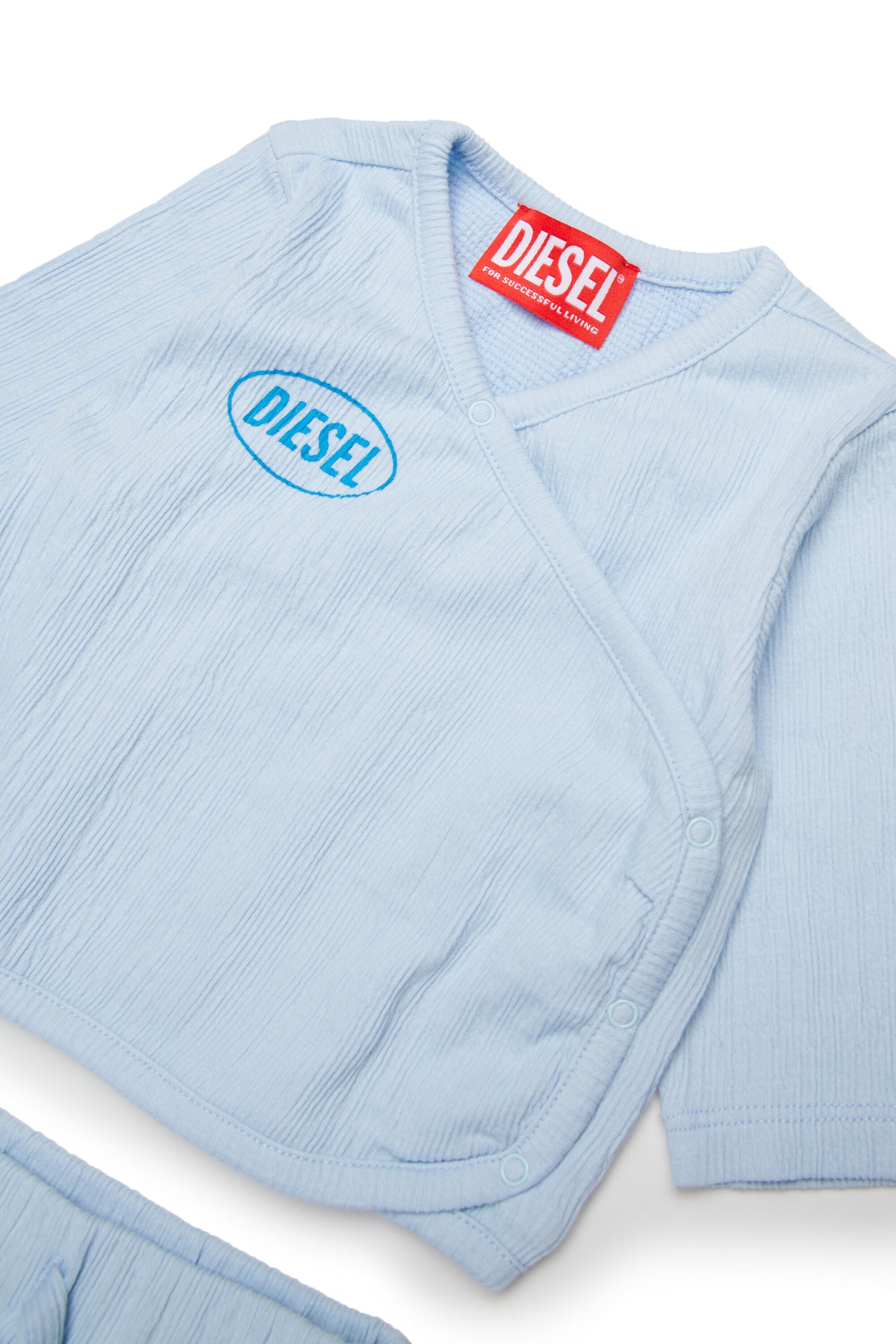 Combinaison bébé avec logo