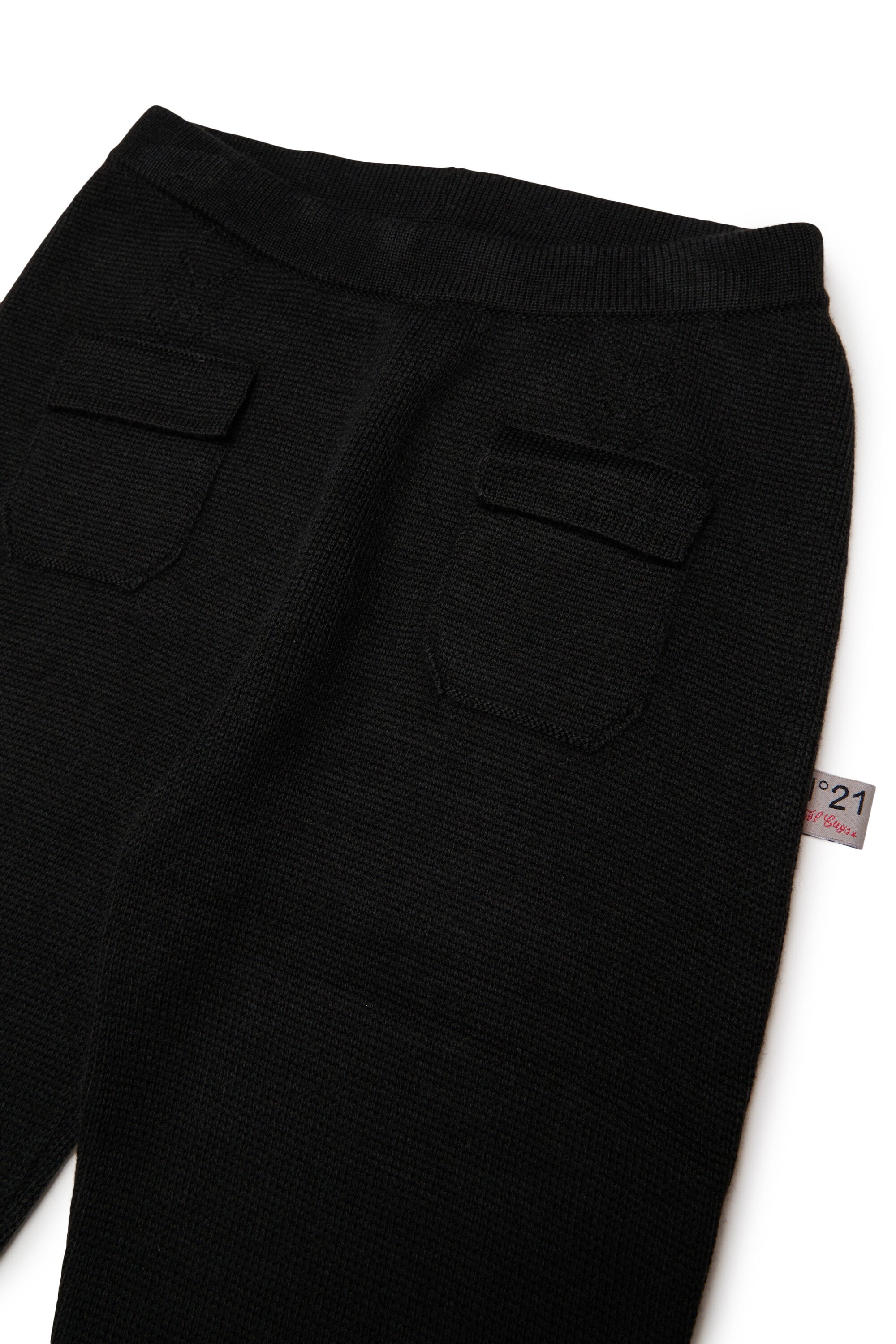 Pantalón acampanado de punto canalé