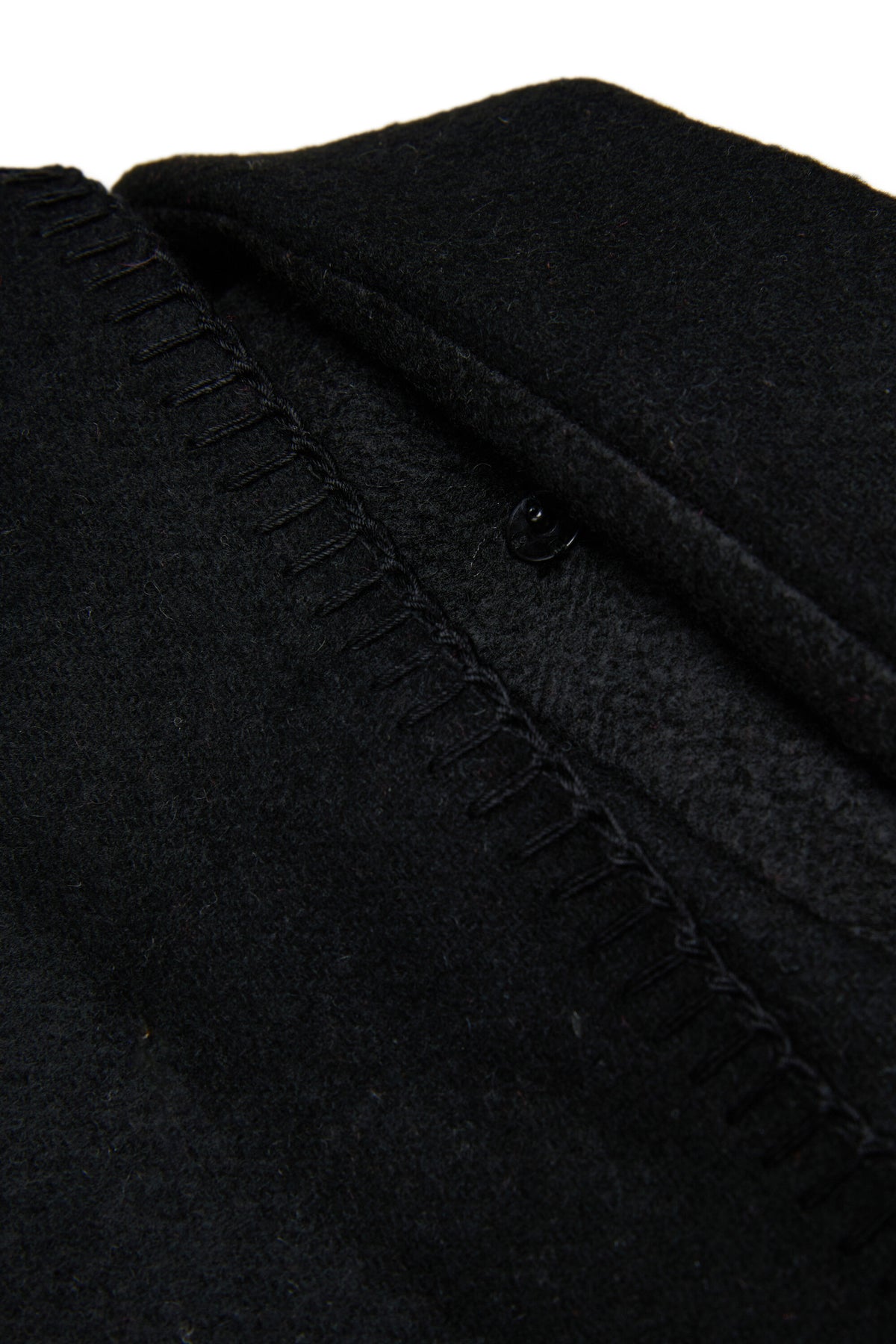 Manteau avec cape décorative